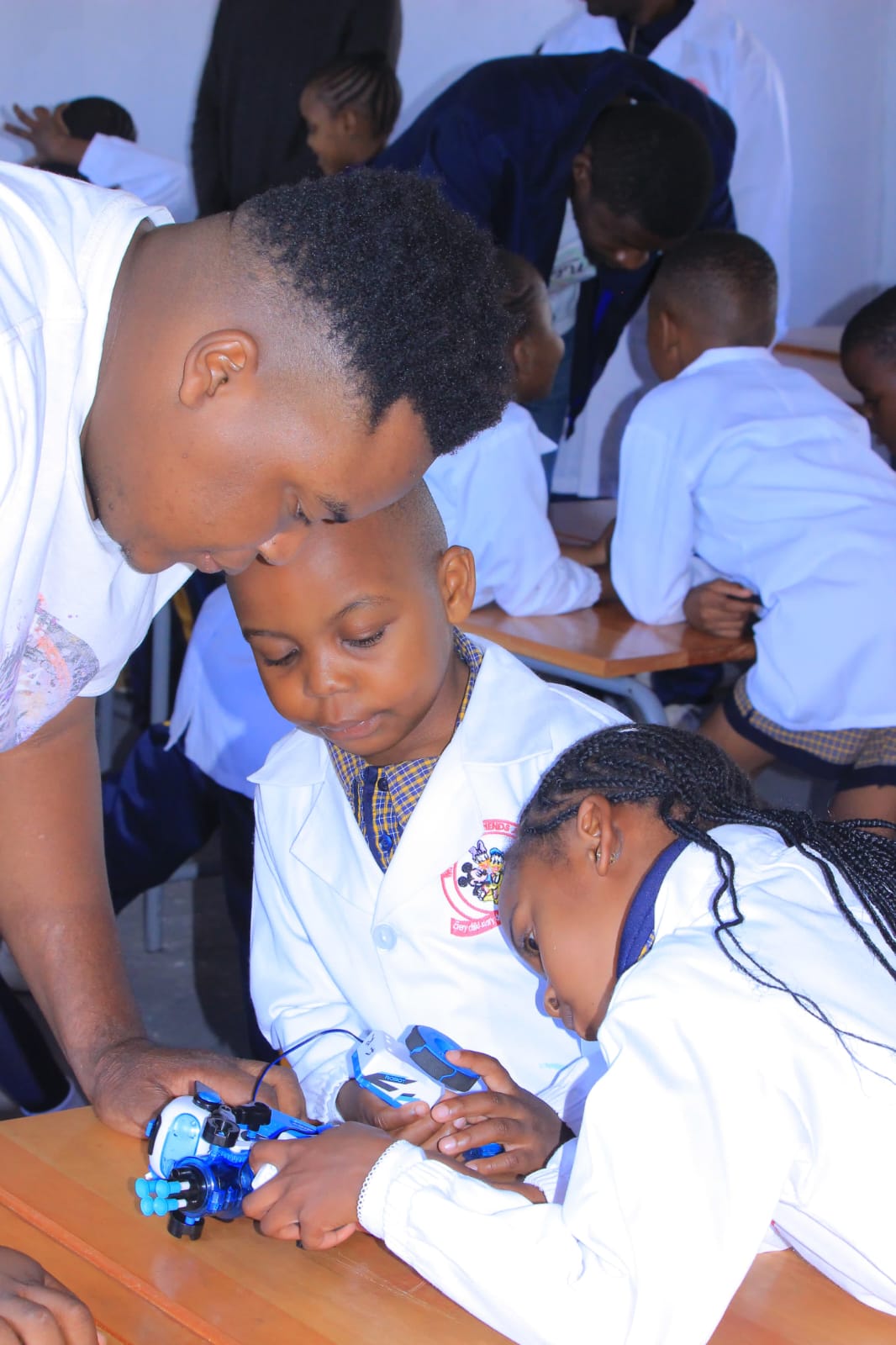 Students building robots together